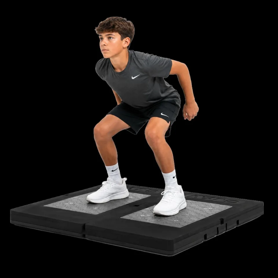Young athlete in counter-movement jump position on VALD ForceDecks dual force plates